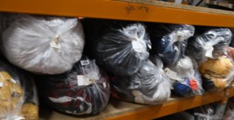 Twelve bags of assorted pre-owned clothing and related items.