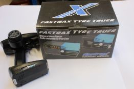 A quantity of electric buggy accessories to include A Fastrax Tyre Truer, Pro-Line off road buggy