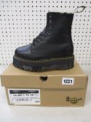 A pair of as new Dr Martens Jadon 8 eye fur lined boots (UK 3).