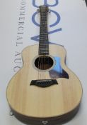 As as new Taylor GS Mini Rosewood acoustic guitar.