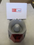 A Cooper Wheelock ASRS-R-DC Multi-Alarm 24VDC Outdoor 104075, grey/red strobe.