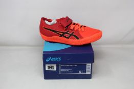 A pair of as new Asics High Jump Pro trainers (UK 5).