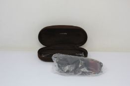 A pair of as new Tom Ford sunglasses.