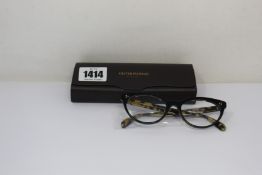 A pair of Oliver Peoples Arella glasses frames.