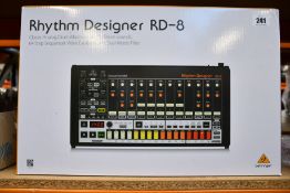 A boxed as new Behringer Rhythm Designer RD-8 drum machine.
