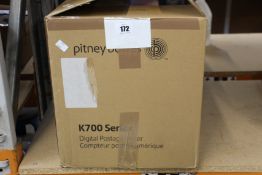 A Pitney Bowes K700 Series digital postage meter.