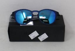 A boxed as new pair of Oakley Pitchman R glasses matte translucent blue frame with Prizm Sapphire
