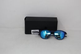 A boxed as new pair of Oakley Pitchman R glasses matte translucent blue frame with Prizm Sapphire