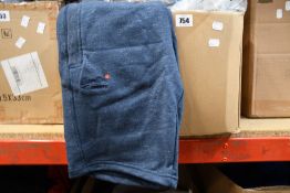 Seventeen items of as new Superdry clothing.