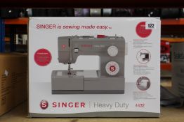 A pre-owned Singer 4432 Heavy Duty Sewing Machine.