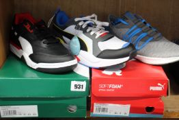 Three pairs of as new Puma trainers; Palace Guard (UK 7.5), NRGY Star Multiknit (UK 7) and one other