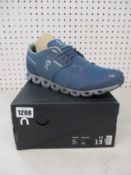 A pair of as new On Running Cloud Waterproof trainers (UK 12.5).
