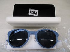 A pair of as new Calvin Klein sunglasses.