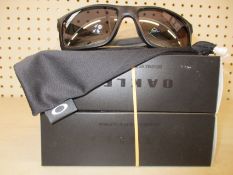 Two boxed as new Oakley Mainlink XL sunglasses matte black frame with prizm black polarized