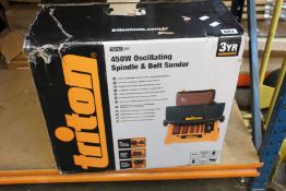 A Triton TSPST450 - 450W Oscillating Spindle and Belt Sander.