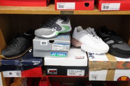 Four pairs of as new trainers; women's Yonex Eclipsion 2 (UK 3.5), Reebok Royal Glide (UK 8), Fila