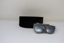 A pair of as new Tom Ford sunglasses.
