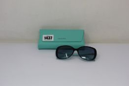 A pair of as new Tiffany & Co sunglasses.