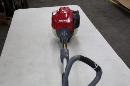 A pre-owned Honda GX25 - 4 Stroke Petrol Strimmer.