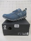 A pair of as new On Running Cloud Waterproof trainers (UK 12).