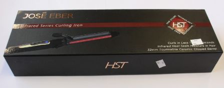 Four boxed as new Jose Eber infrared curling irons.