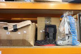 A quantity of Airselect Elite and Procare walker aid boots (Approximately 10).