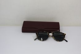 A pair of Oliver Peoples O'Malley sunglasses.