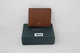 An as new Mulberry 8 card wallet in brown leather.