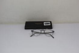 A pair of Oliver Peoples Riley-R glasses frames.