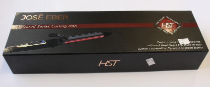 Four boxed as new Jose Eber infrared curling irons.