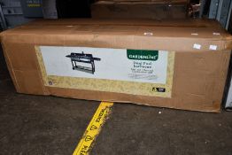 A Gardenline dual fuel barbeque.