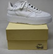 A pair of as new Axel Arigato Orbit sneakers (UK 6.5).