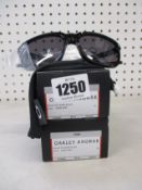 Two boxed of as new Oakley Anorak sunglasses polished black frame with prizm grey lenses (