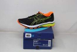 A pair of as new Asics GT-1000 8 (UK 6.5).
