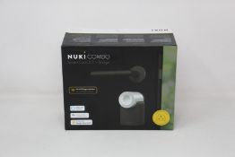 A boxed as new Nuki Combo Smart lock 2.0 + Bridge (Compatible with UK sockets).