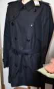 An as new Burberry Chelsea trench coat (Size 48 - RRP £1,650).