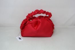 An as new S.Joon Baby Bao bag in red (RRP £350).