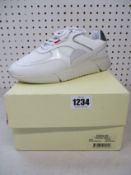 A pair of as new Axel Arigato Genesis Triple sneakers (UK 6.5).