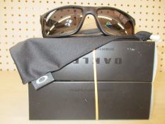 Two boxed as new Oakley Mainlink XL sunglasses matte black frame with prizm black polarized
