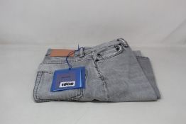 A pair of as new ACNE Studios Bla Konst jeans (W23/L30).