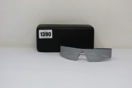 A pair of as new Balenciaga sunglasses (Slight scratch on lens).