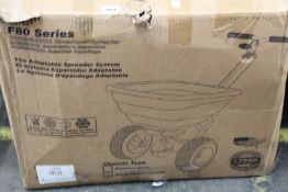 An EarthWay EV-N-SPRED Flex Select F80 Salt Spreader.