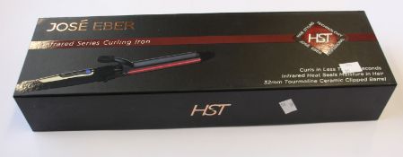 Four boxed as new Jose Eber infrared curling irons.