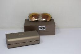 A pair of as new Bvlgari sunglasses.