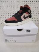 A pair of women's as new Nike Air Jordan 1 Mid (UK 6).