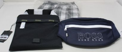 Two pairs of as new Hugo Boss slides/flip-flops (UK 11), pair of boxer shorts (M), side bag and