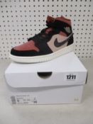 A pair of women's as new Nike Air Jordan 1 Mid (UK 6.5).