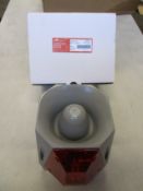 A Cooper Wheelock ASRS-R-DC Multi-Alarm 24VDC Outdoor 104075, grey/red strobe.