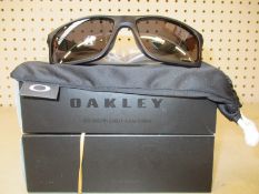 Two boxed as new Oakley Mainlink XL sunglasses matte black frame with prizm black polarized