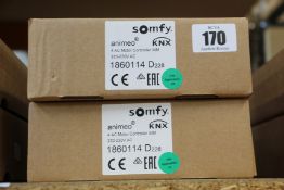 Two Somfy Animeo KNX 4 AC motor controllers.